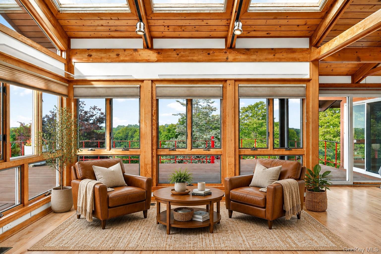 165 Hasbrouck Road Goshen, NY 10924 - Photo 20 of 50 Surrounded by windows and wood, the living room has almost treehouse vibes*virtually staged*