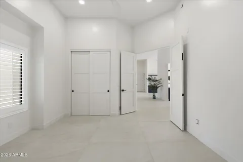 a kitchen with stainless steel appliances granite countertop a sink a stove and a wooden floors