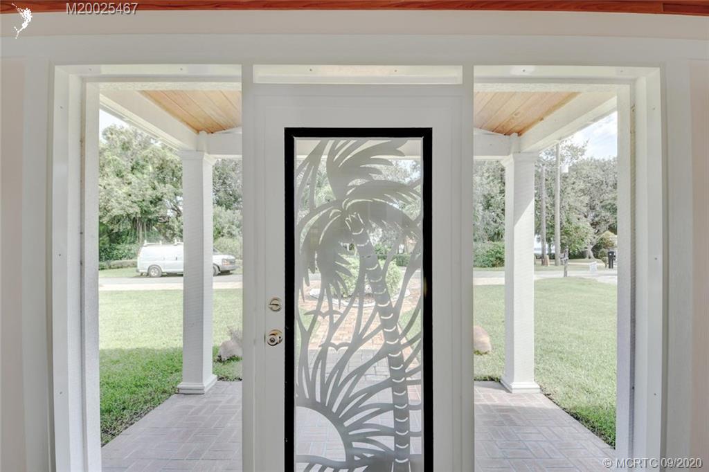 904 Southeast Riverside Drive Stuart, FL 34994 - Photo 8 of 72 Decorative entry onto the front porch.