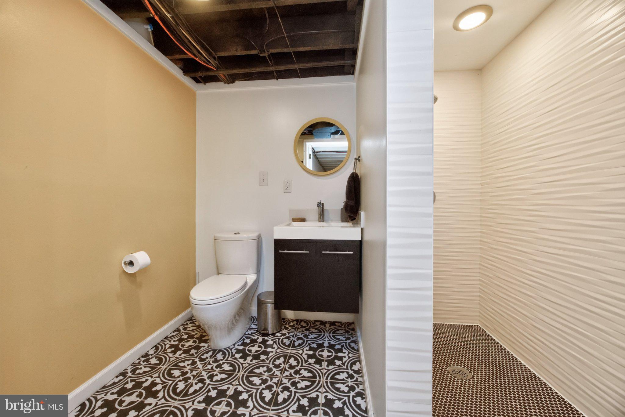 1015 Chester Springs Road Phoenixville, PA 19460 - Photo 34 of 68 Chic bathroom with stylish tile design.