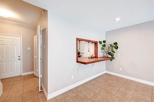 a view of kitchen with furniture and wooden floor