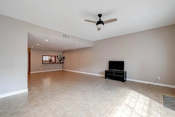 a view of livingroom with a workspace