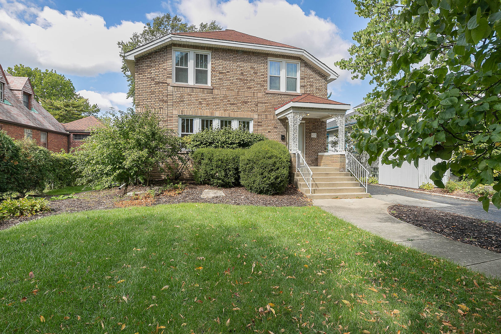 452 Loudon Road Riverside, IL 60546 - Photo 1 of 28 a front view of a house with a garden