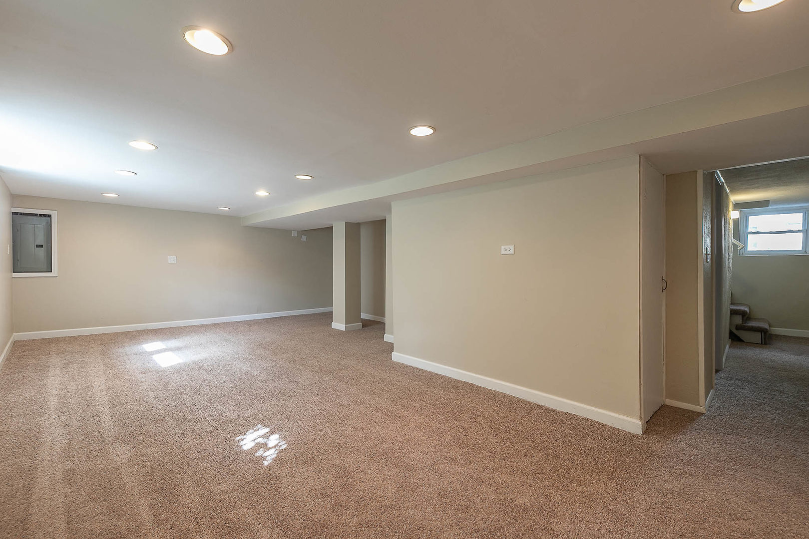 452 Loudon Road Riverside, IL 60546 - Photo 22 of 28 an empty room with windows and entrance to other room