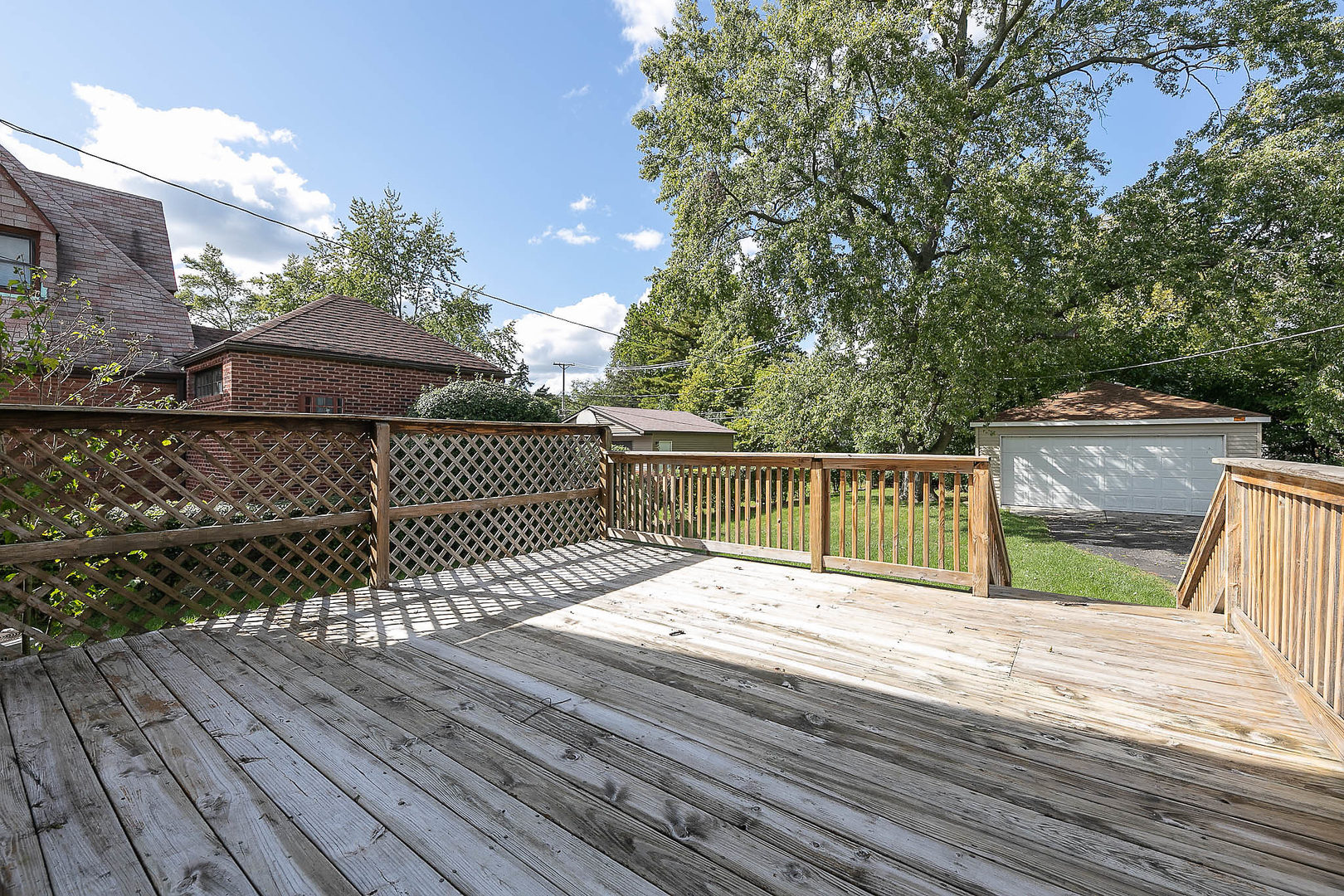 452 Loudon Road Riverside, IL 60546 - Photo 26 of 28 a deck view with wooden floor and fence