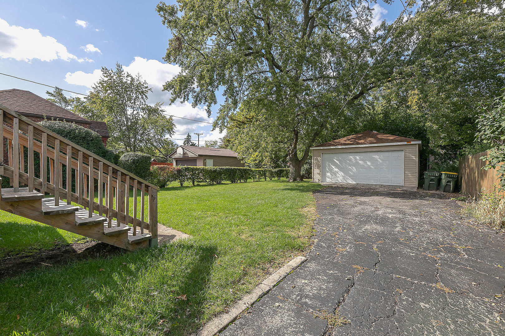 452 Loudon Road Riverside, IL 60546 - Photo 28 of 28 a view of a house with backyard and a tree