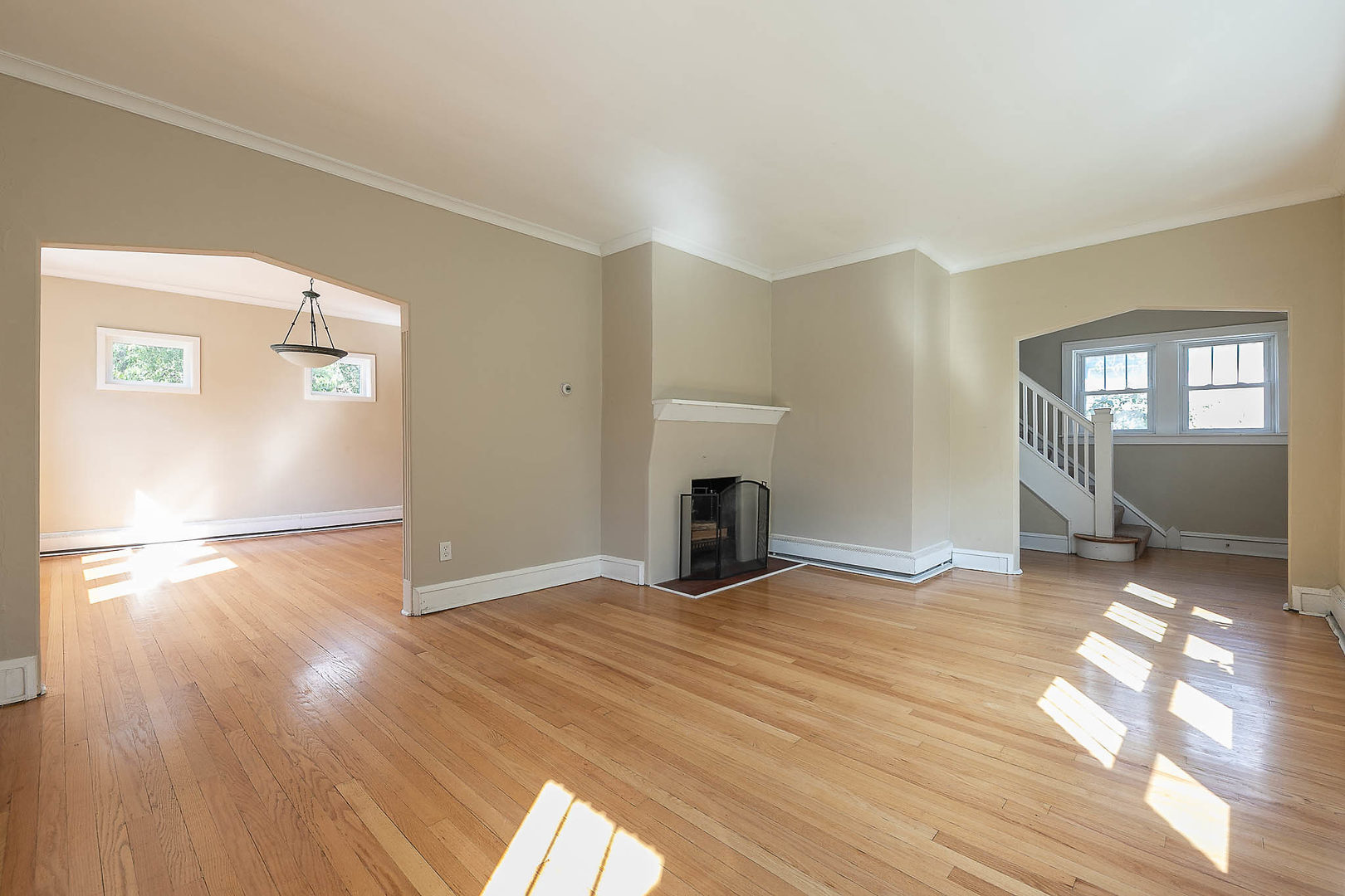452 Loudon Road Riverside, IL 60546 - Photo 7 of 28 a view of empty room with wooden floor and fireplace