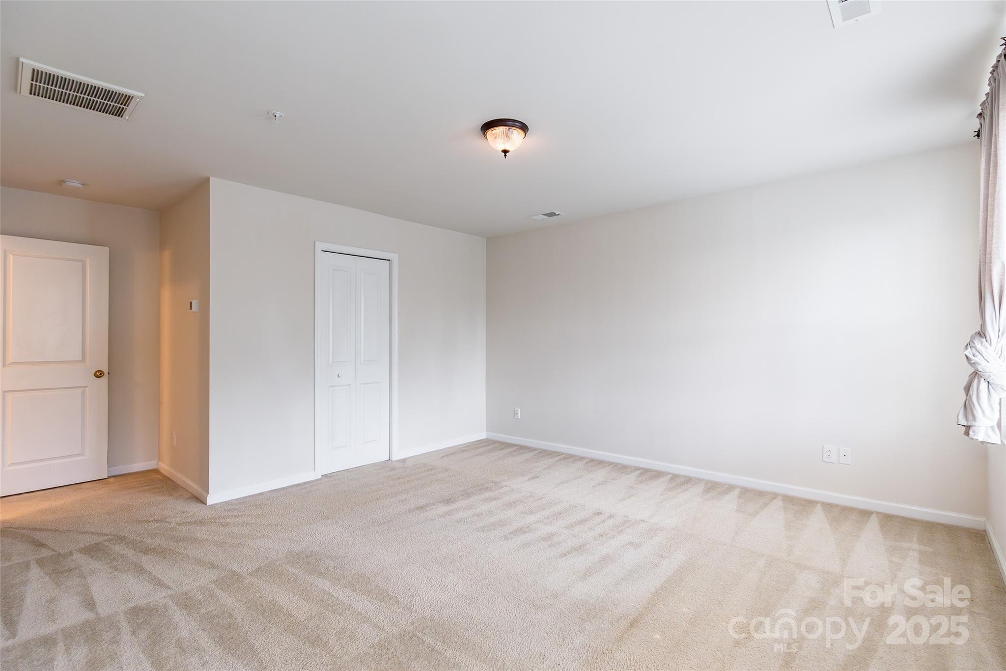 1128 Tangle Ridge Drive Southeast Concord, NC 28025 - Photo 14 of 27 a view of an empty room