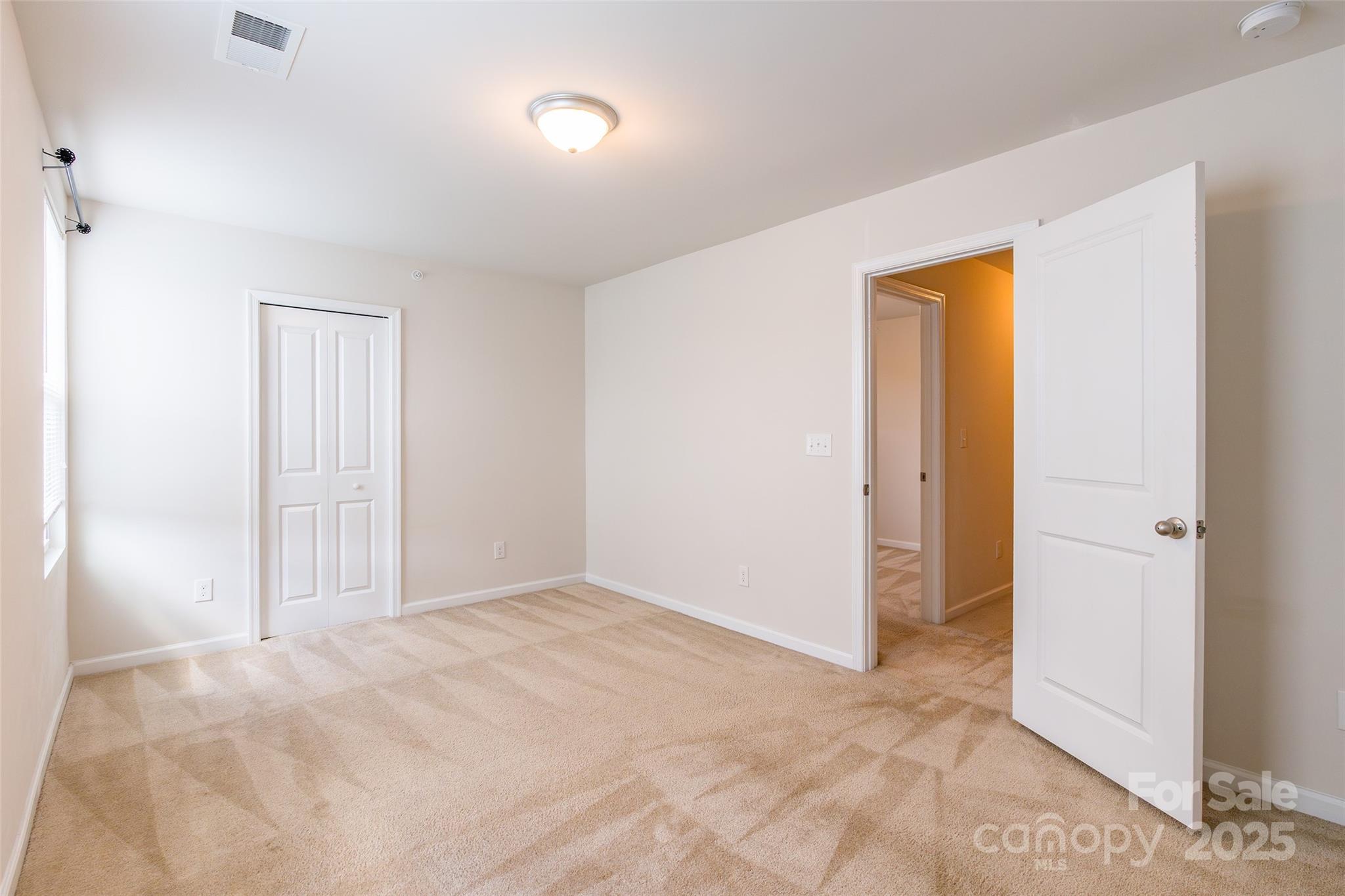 1128 Tangle Ridge Drive Southeast Concord, NC 28025 - Photo 23 of 27 a view of an empty room
