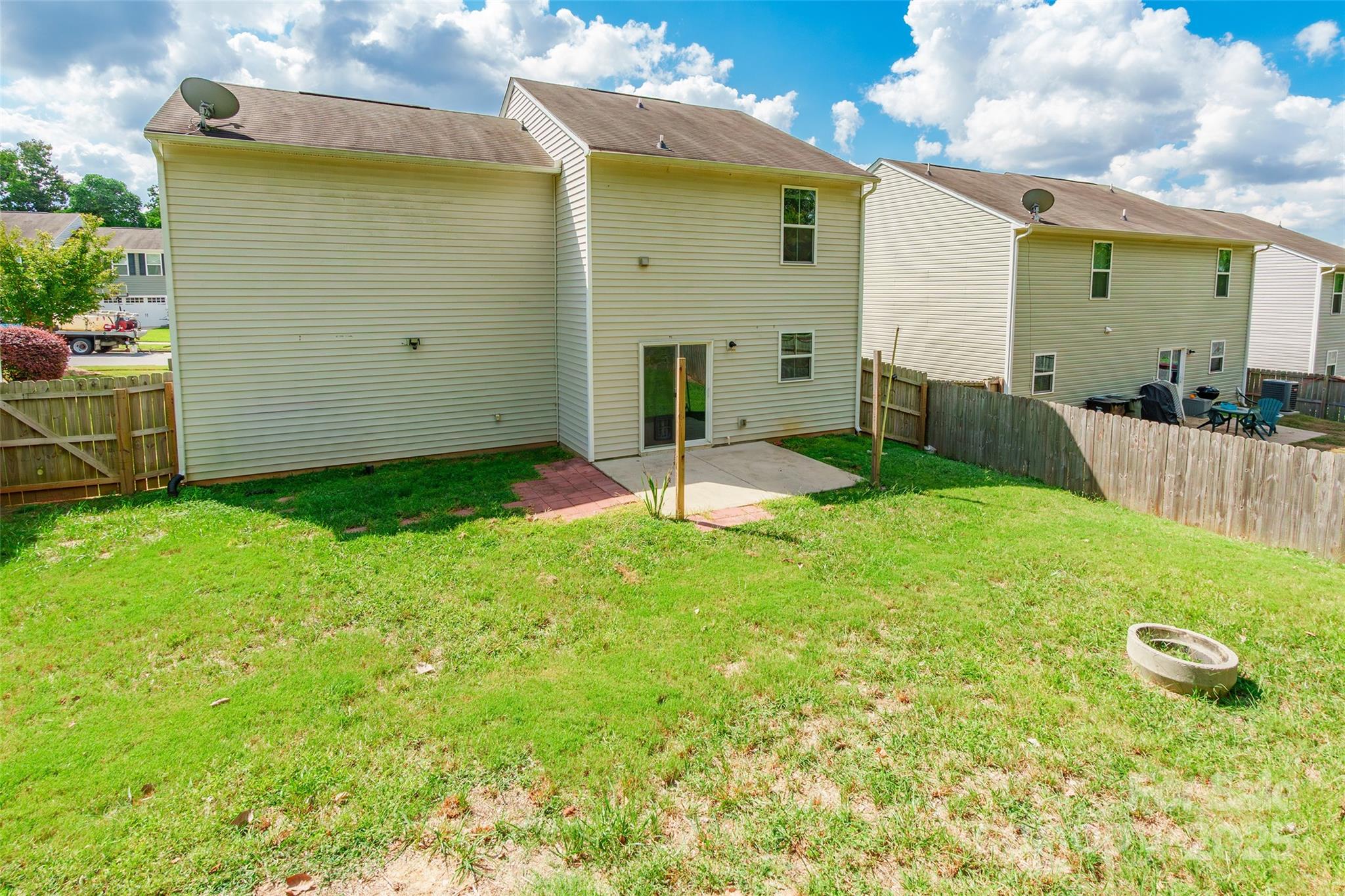 1128 Tangle Ridge Drive Southeast Concord, NC 28025 - Photo 26 of 27 a view of a backyard with a garden and entertaining space
