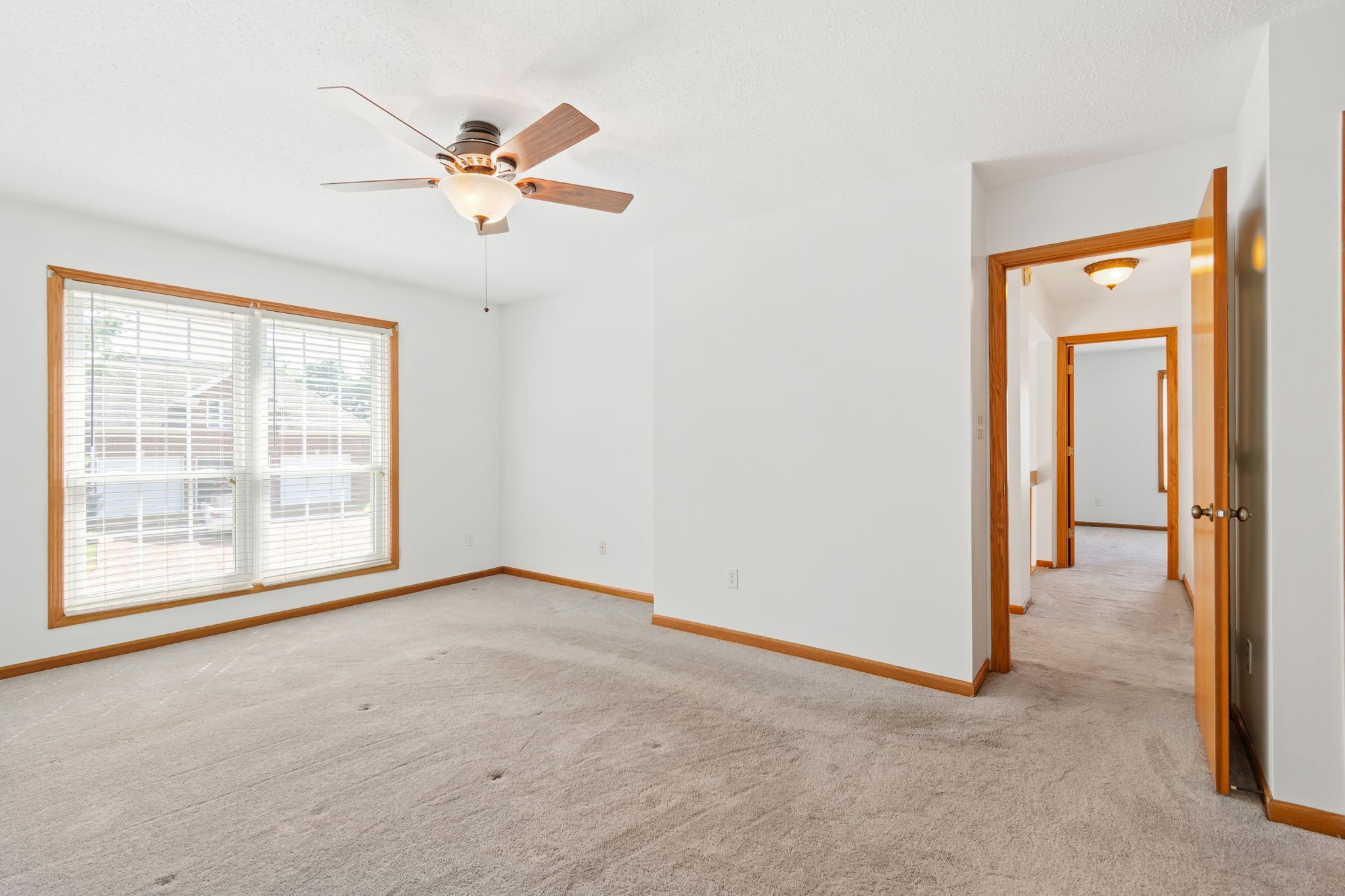 5002 Camelot Drive, Unit C Columbia, TN 38401 - Photo 17 of 46 an empty room with fan and windows