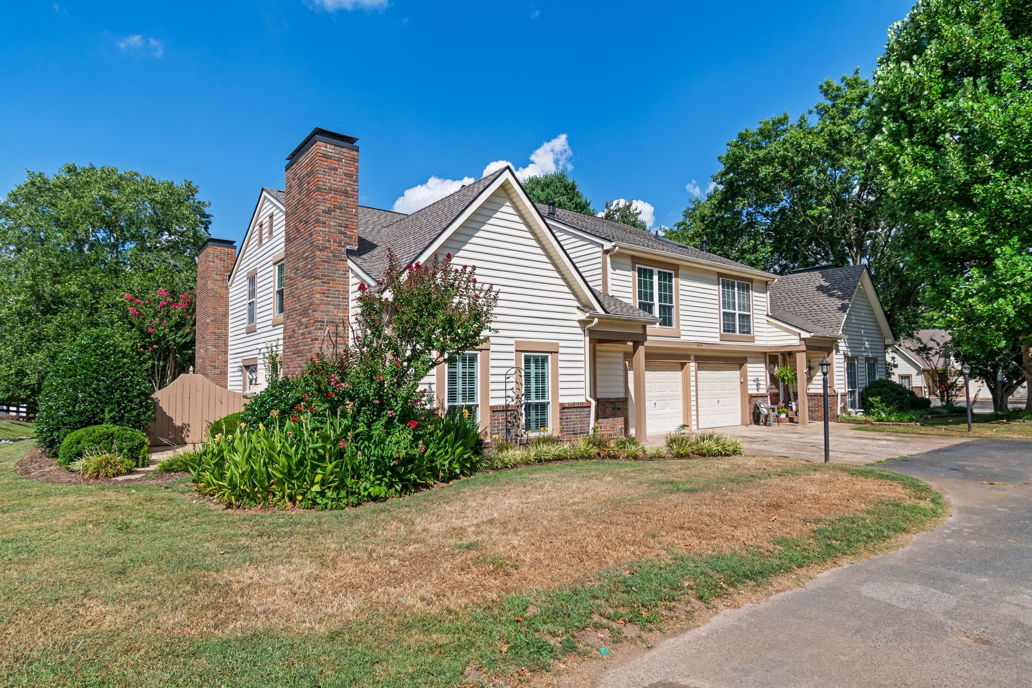 5002 Camelot Drive, Unit C Columbia, TN 38401 - Photo 3 of 46 a front view of a house with a garden