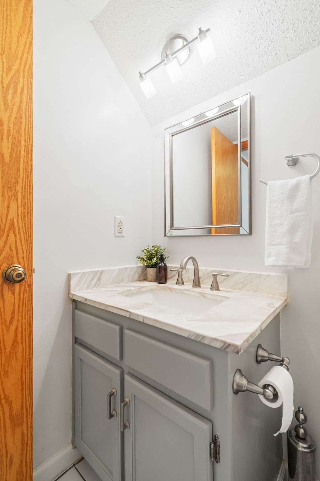 5002 Camelot Drive, Unit C Columbia, TN 38401 - Photo 39 of 46 a bathroom with a sink and a mirror