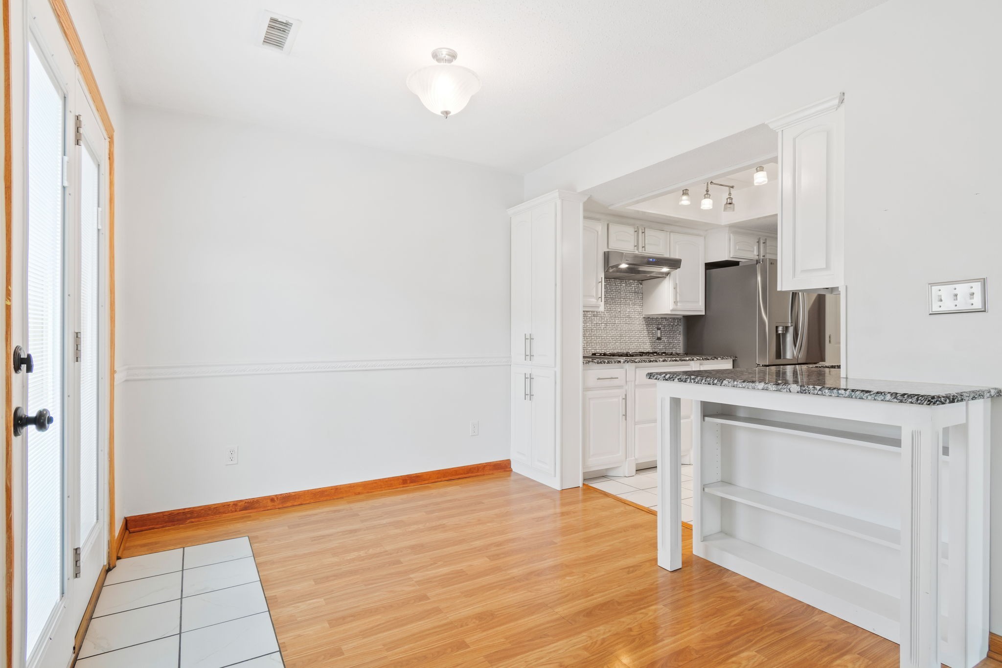 5002 Camelot Drive, Unit C Columbia, TN 38401 - Photo 10 of 46 a room with a bed and a view of kitchen