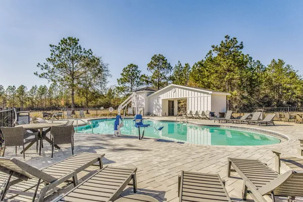 a view of a swimming pool and outdoor space
