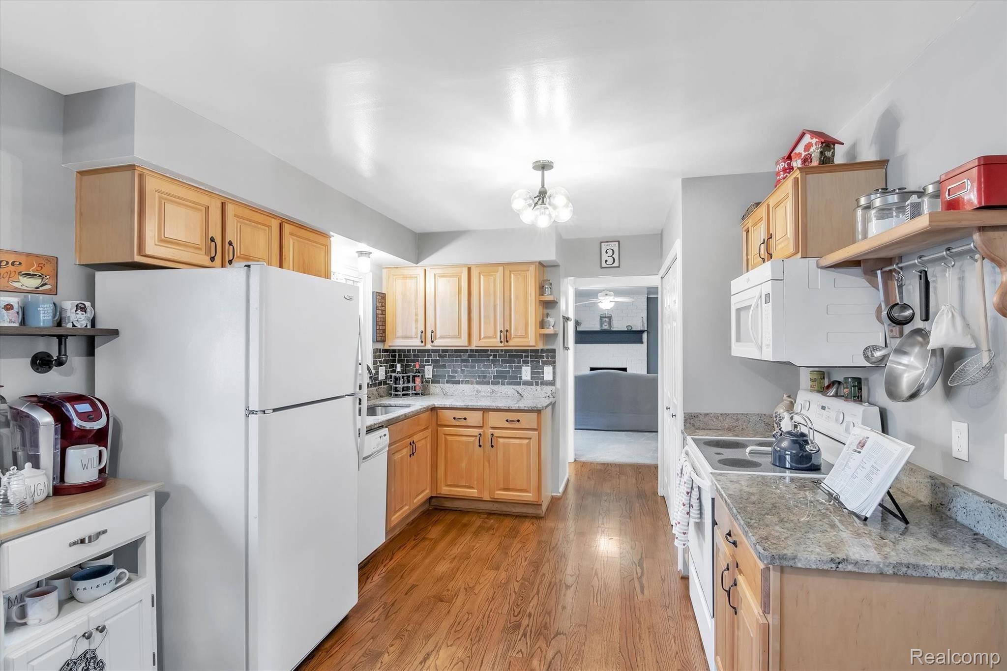 6344 Raintree Drive Canton, MI 48187 - Photo 10 of 38 Hardwood floors & granite countertops