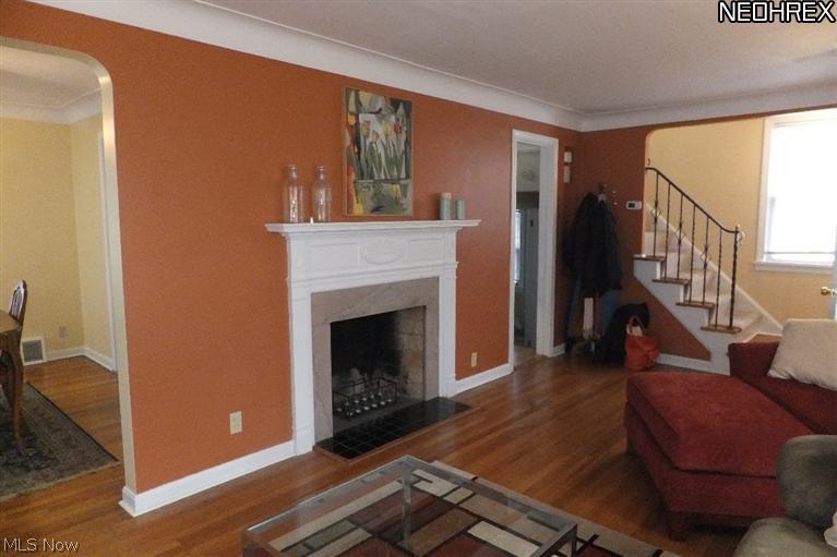 3533 Radcliffe Road Cleveland Heights, OH 44121 - Photo 2 of 12 Warm colors, hardwood floors, crisp-white moulding and architectural details all around this home!