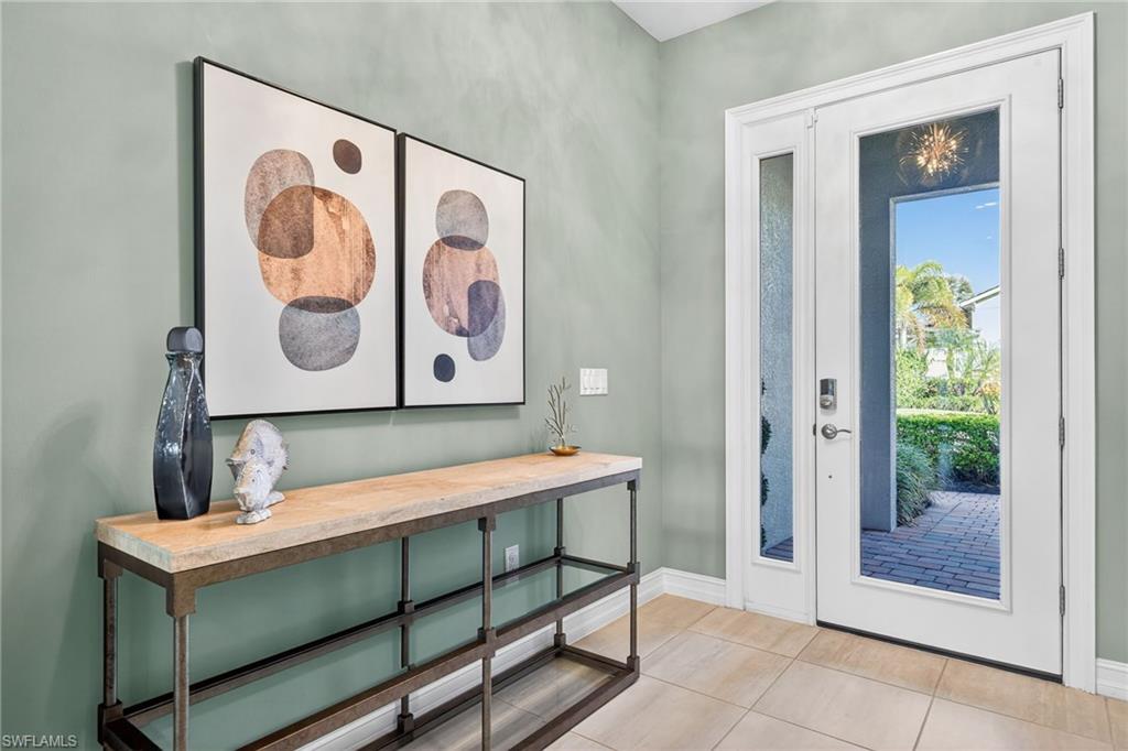 14523 Kelson Circle Naples, FL 34114 - Photo 2 of 50 a view of a bench in a room