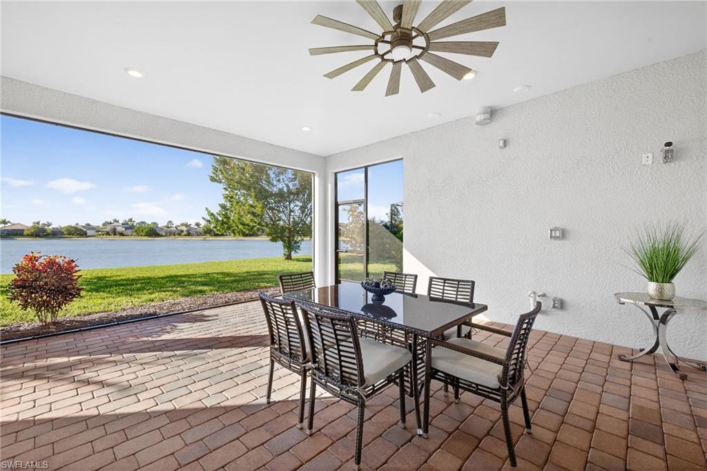 14523 Kelson Circle Naples, FL 34114 - Photo 33 of 50 a view of a dining room with furniture window and outside view