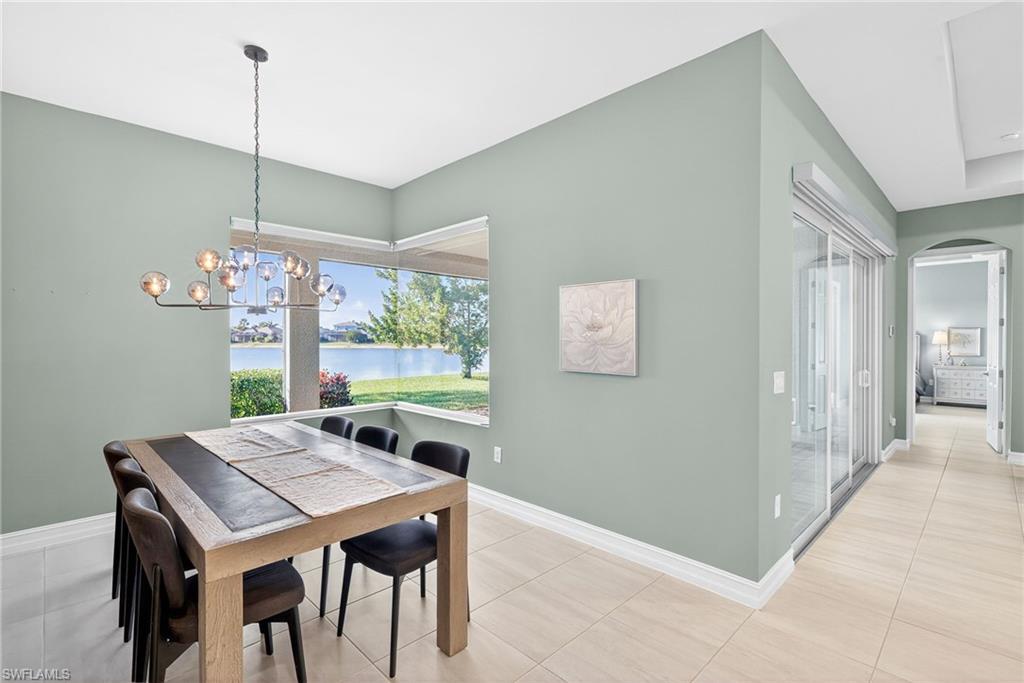 14523 Kelson Circle Naples, FL 34114 - Photo 8 of 50 a view of a dining room with furniture window and outside view
