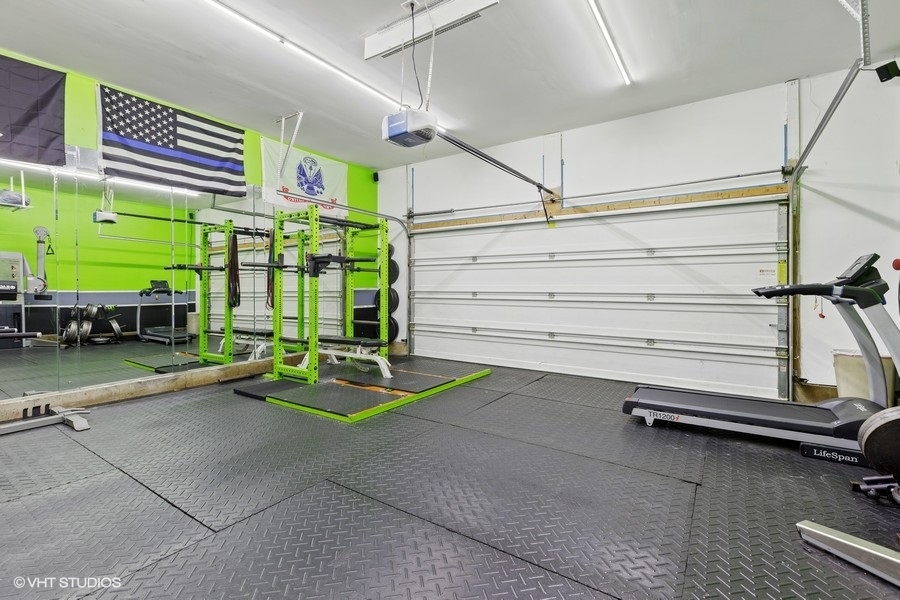 1825 Powers Road Woodstock, IL 60098 - Photo 16 of 18 a room with gym equipment and a window