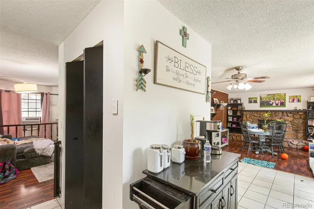 a kitchen with stainless steel appliances granite countertop a stove and a refrigerator