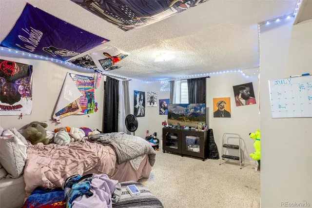 a bedroom with furniture and a bed