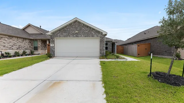 a house view with a garden space