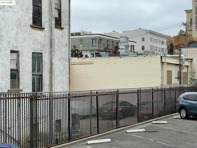 a view of a building from a balcony