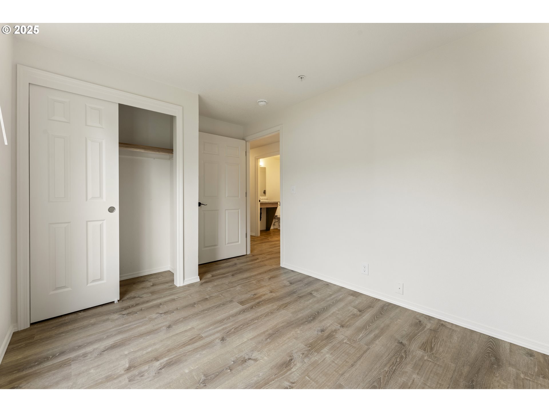 1530 Southeast 5th Street Gresham, OR 97080 - Photo 27 of 39 a view of an empty room and wooden floor