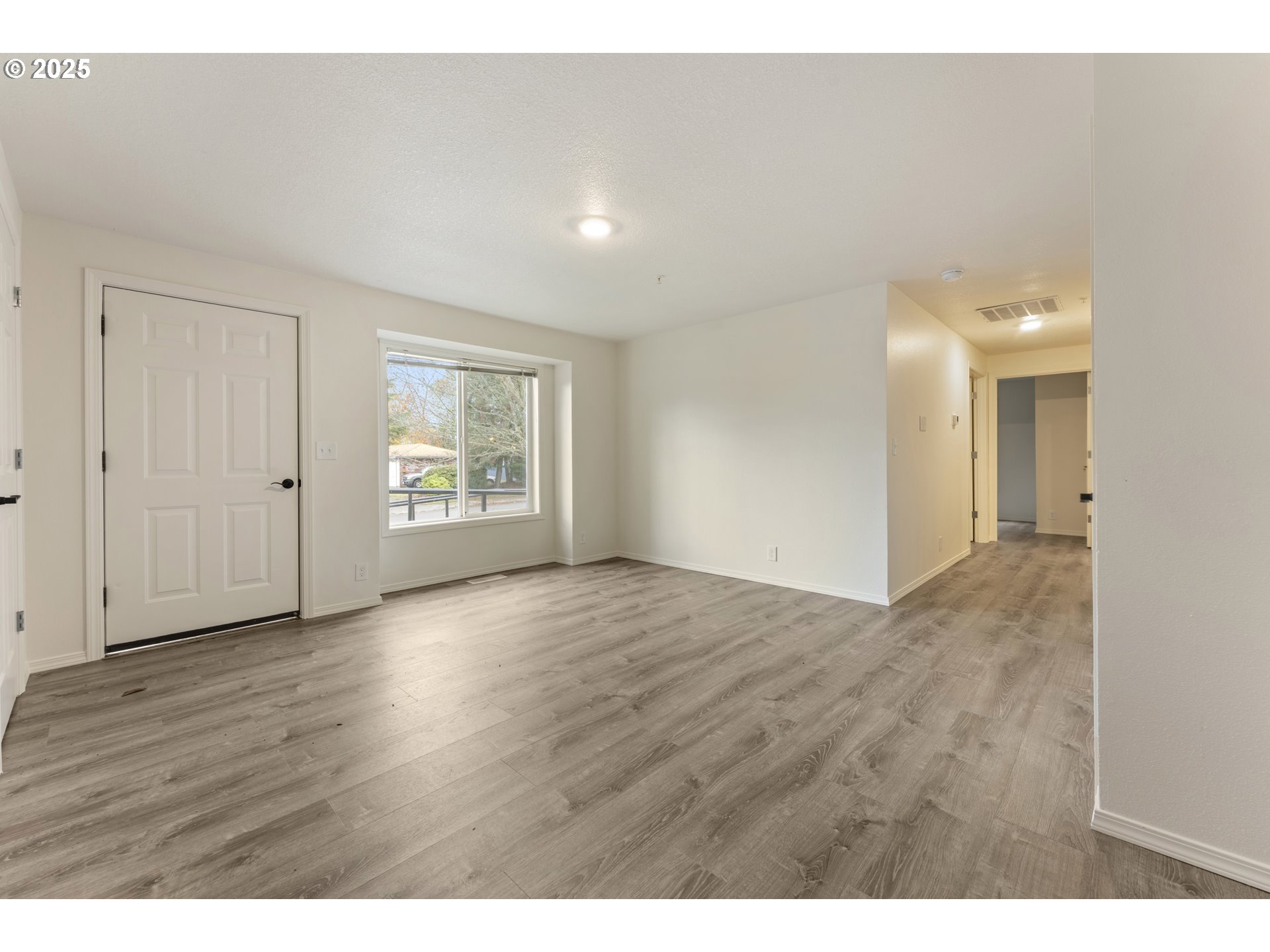 1530 Southeast 5th Street Gresham, OR 97080 - Photo 5 of 39 a view of an empty room and window