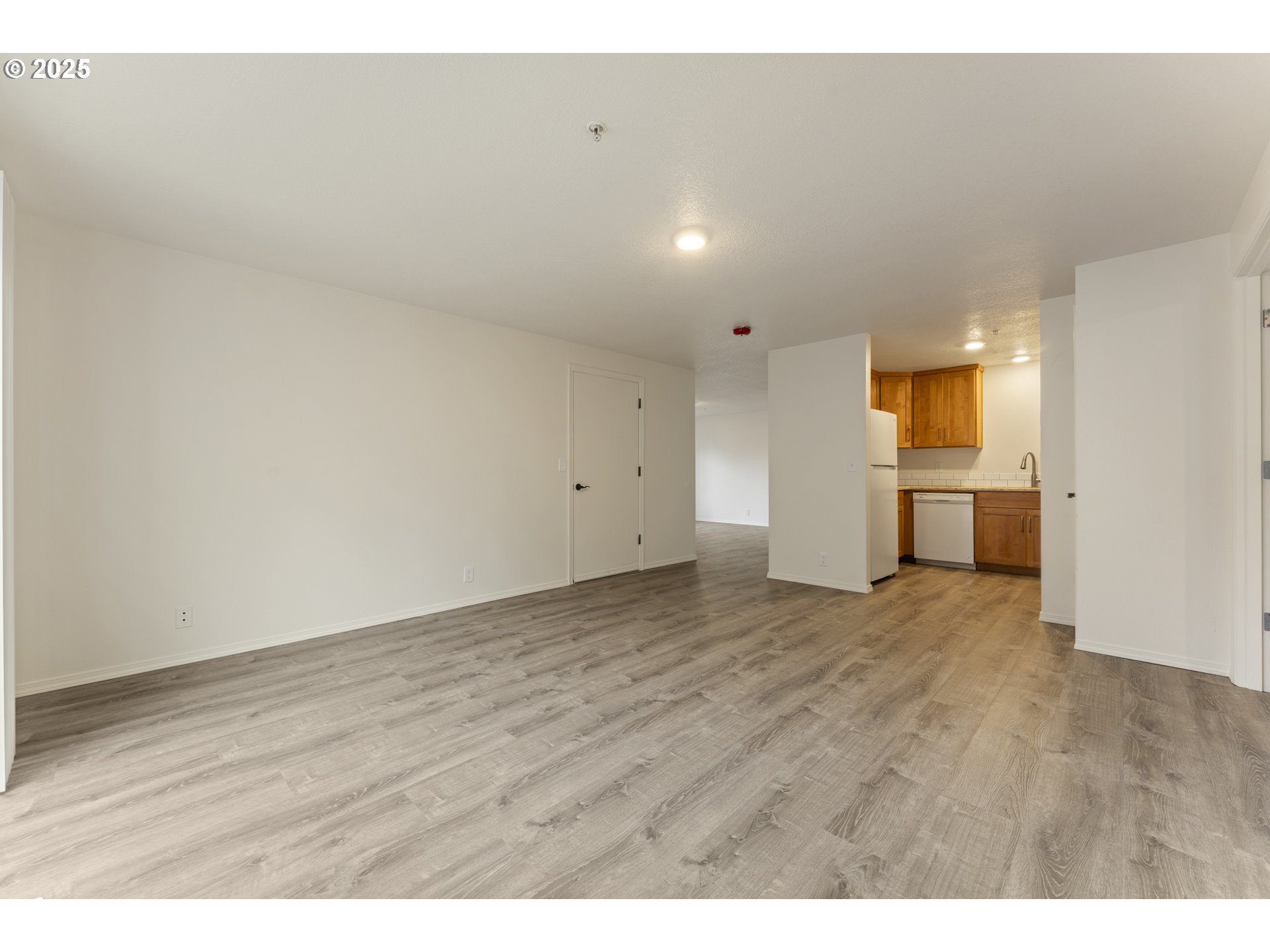 1530 Southeast 5th Street Gresham, OR 97080 - Photo 8 of 39 a view of empty room with wooden floor