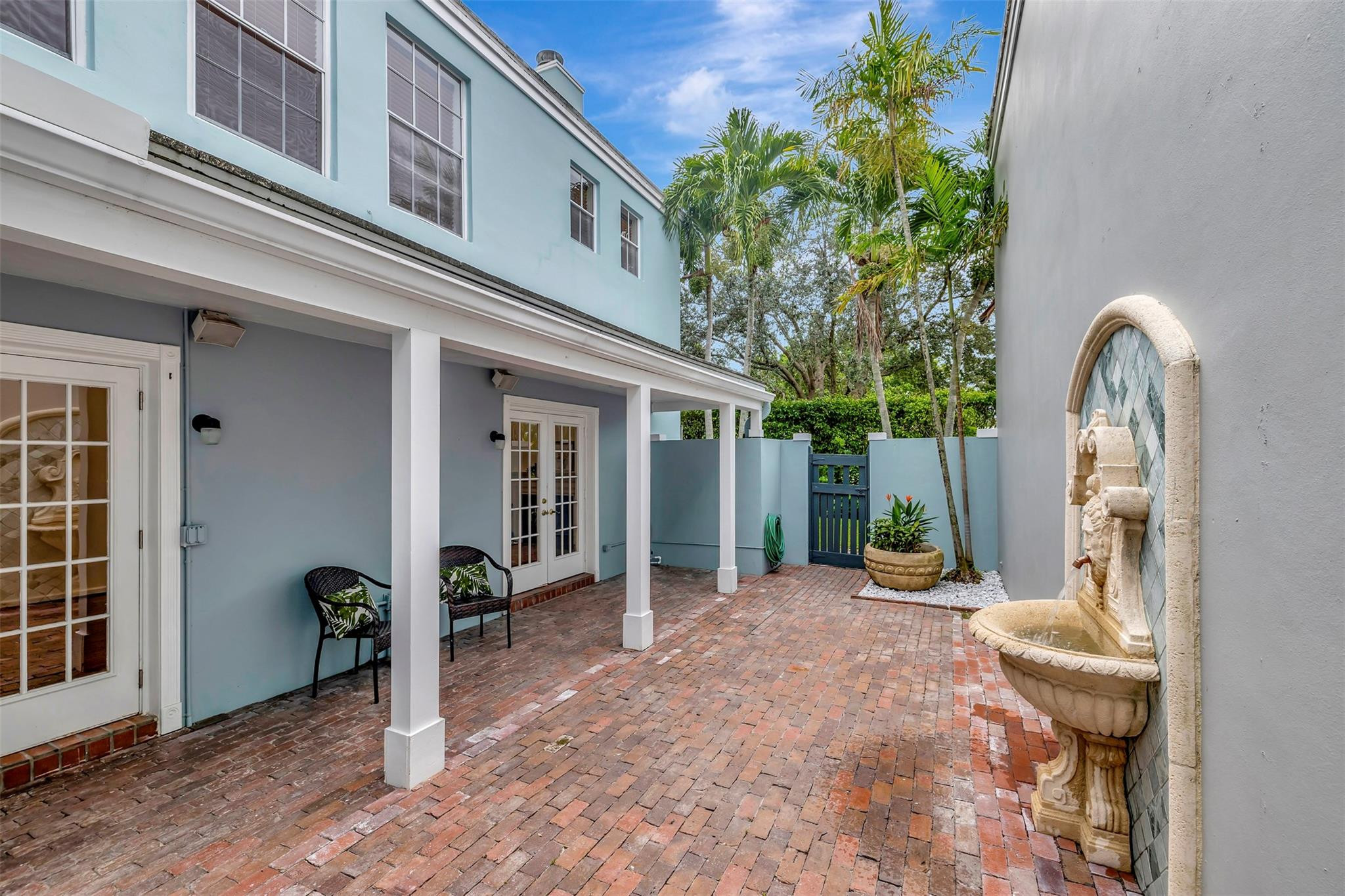 5889 Bartram Street Boca Raton, FL 33433 - Photo 41 of 66 Courtyard patio with built in wall patio