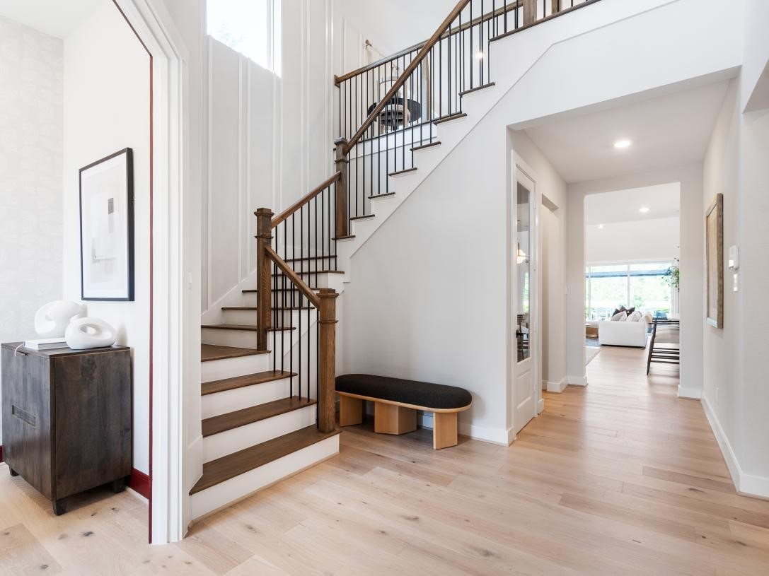 4938 Northern Wds Drive Spring, TX 77386 - Photo 2 of 11 a view of a hallway with wooden floor and entryway