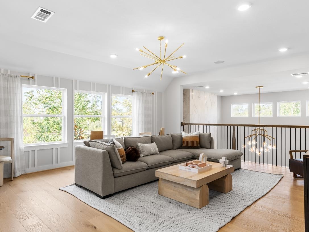 4938 Northern Wds Drive Spring, TX 77386 - Photo 8 of 11 a living room with furniture and a large window