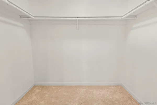 a view of a room with shelf in it