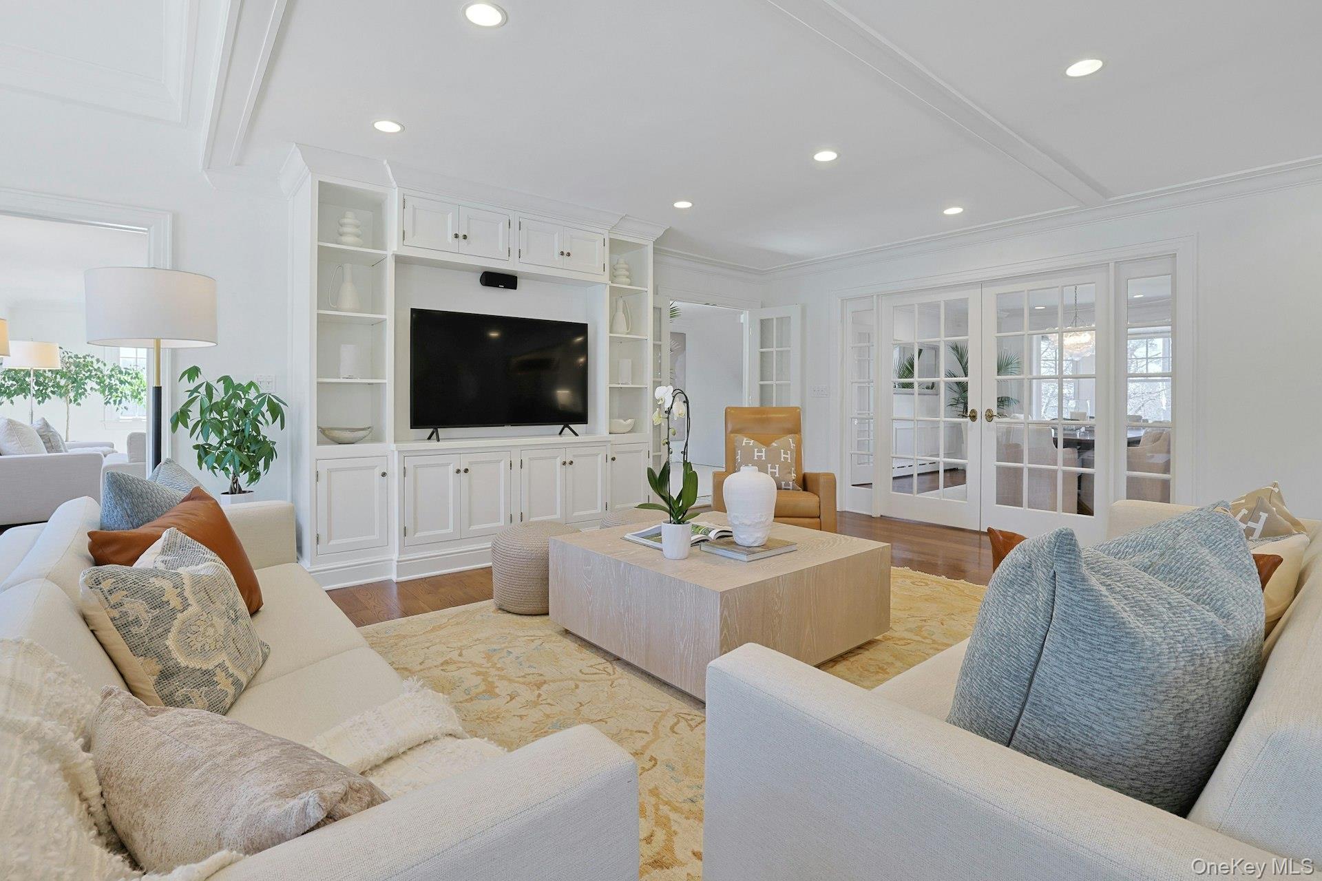 369 Evandale Road Scarsdale, NY 10583 - Photo 11 of 49 Thoughtfully designed built-ins add style, function, and exceptional storage to the family room.