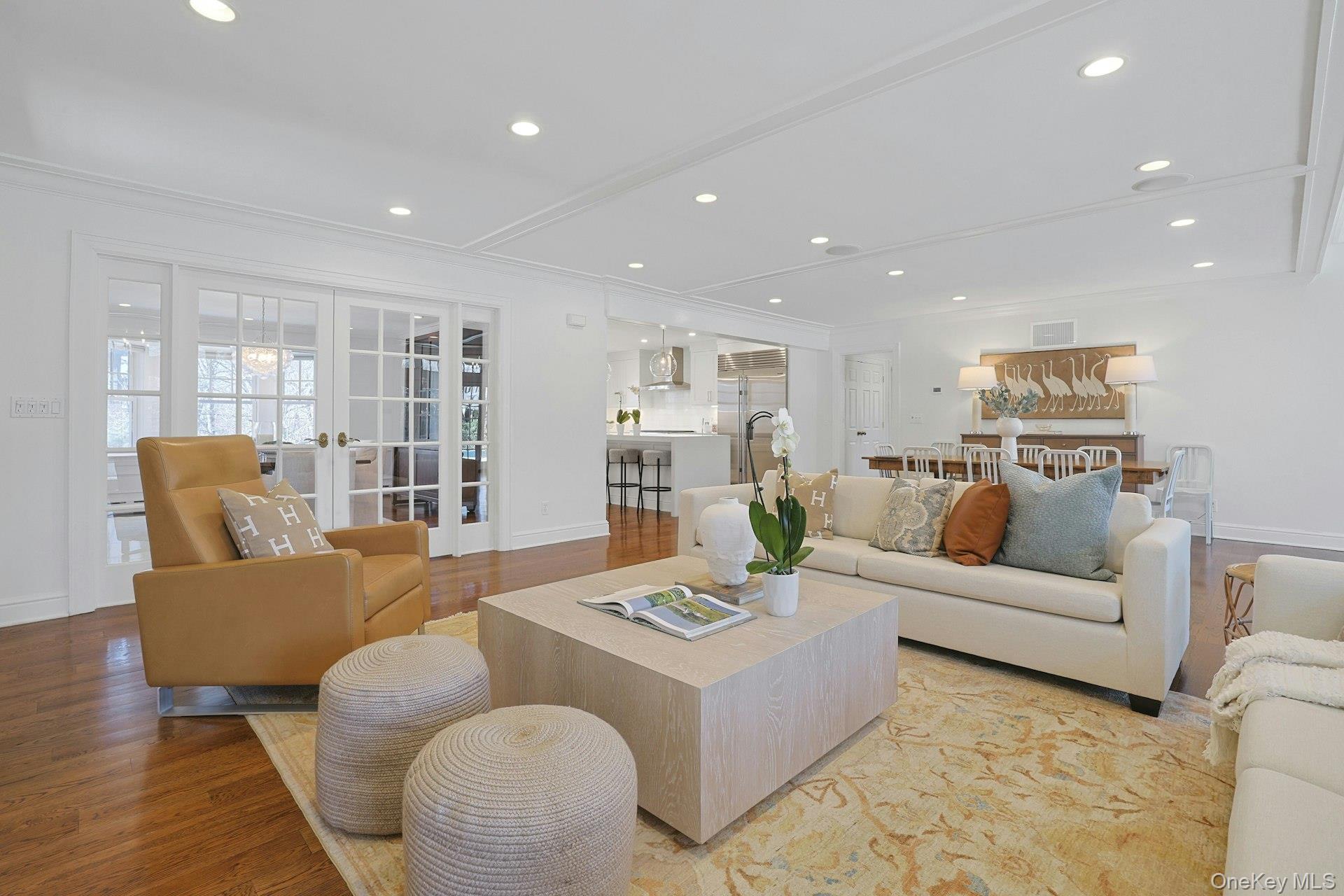 369 Evandale Road Scarsdale, NY 10583 - Photo 12 of 49 Expanded view of the family room highlighting the open flow.