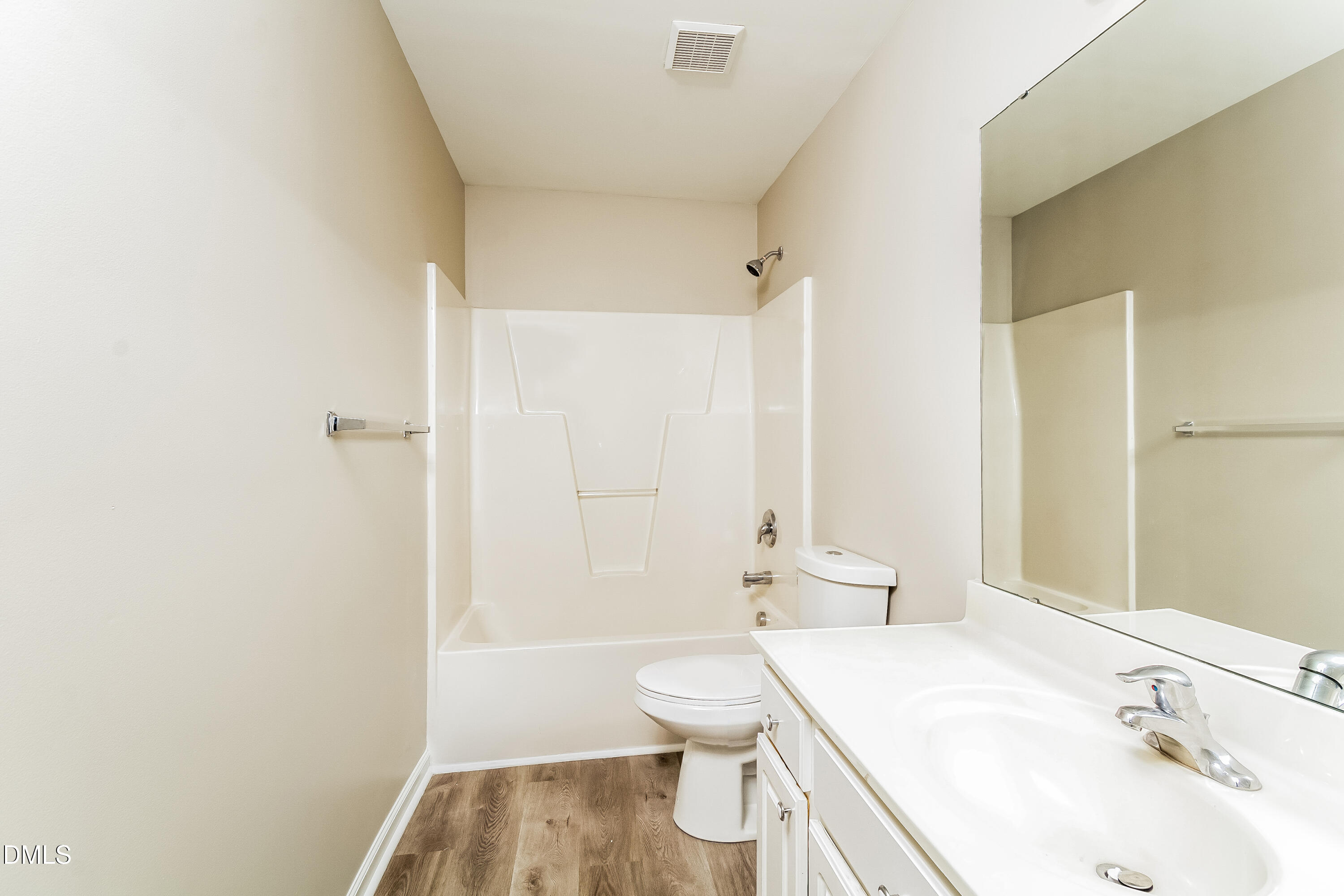 1413 Cozart Street Durham, NC 27704 - Photo 13 of 17 a bathroom with a sink a toilet and shower