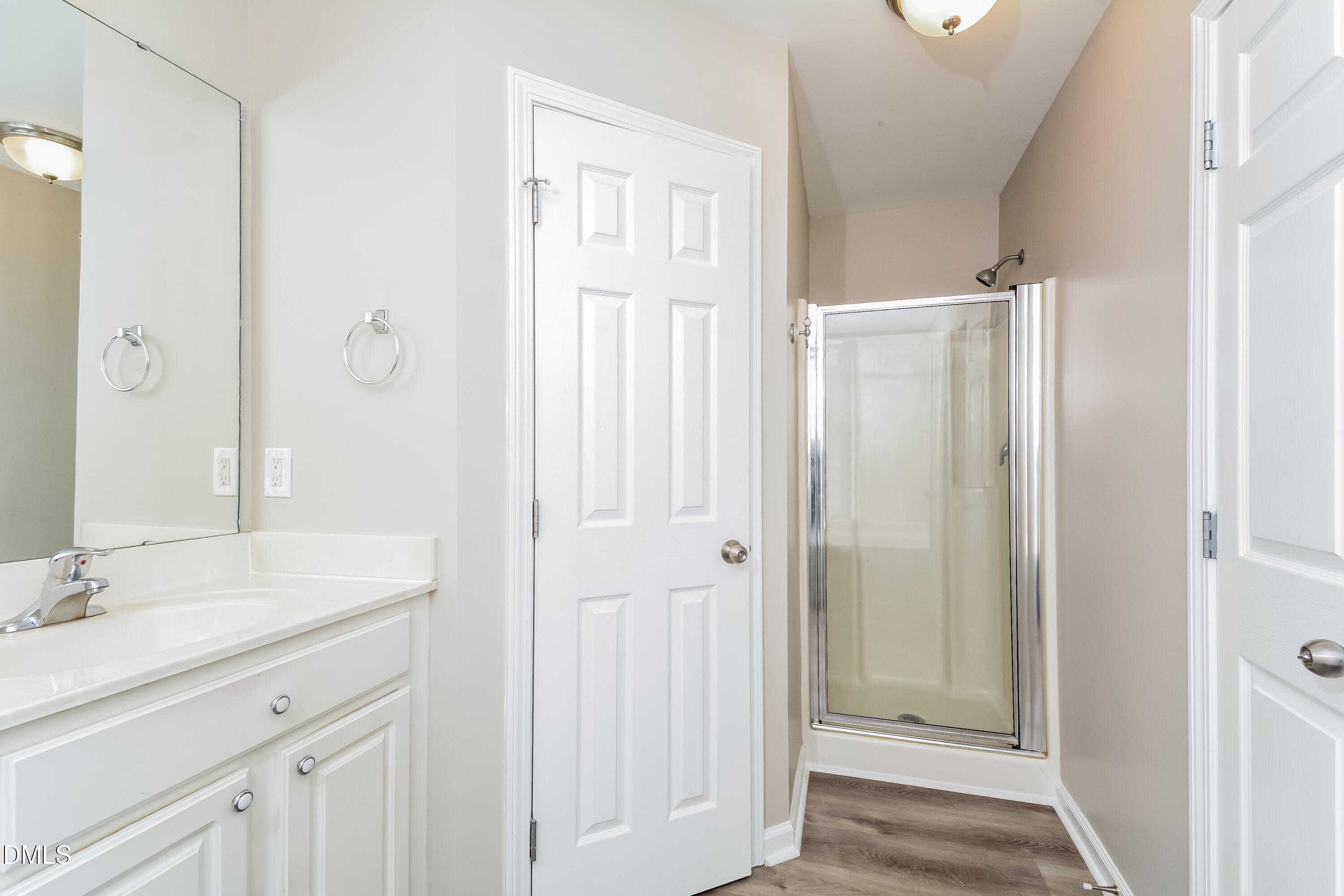 1413 Cozart Street Durham, NC 27704 - Photo 7 of 17 a bathroom with a sink and a mirror