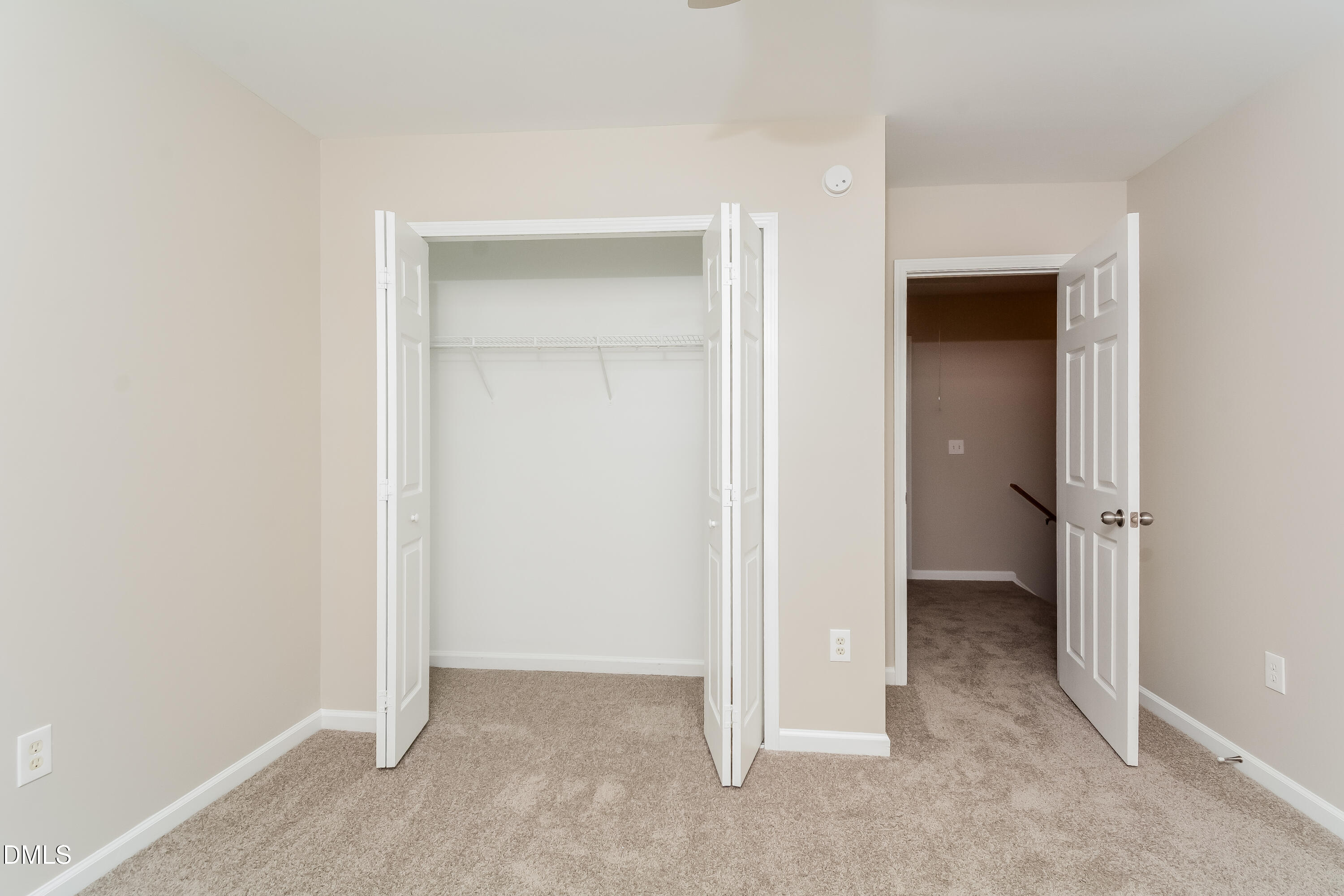 1413 Cozart Street Durham, NC 27704 - Photo 9 of 17 a view of an empty room with closet and a bathroom
