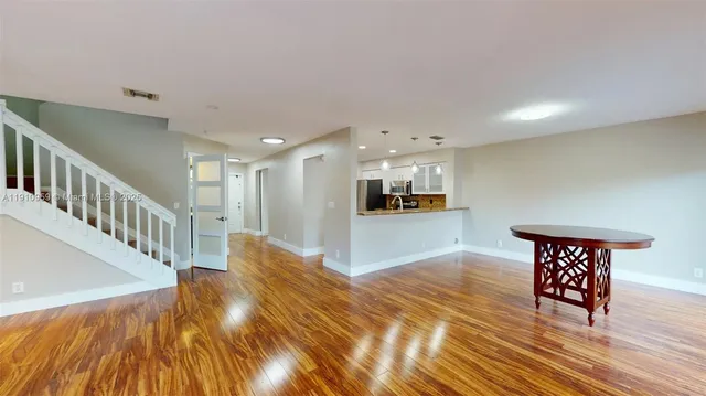 a view of livingroom and dining room