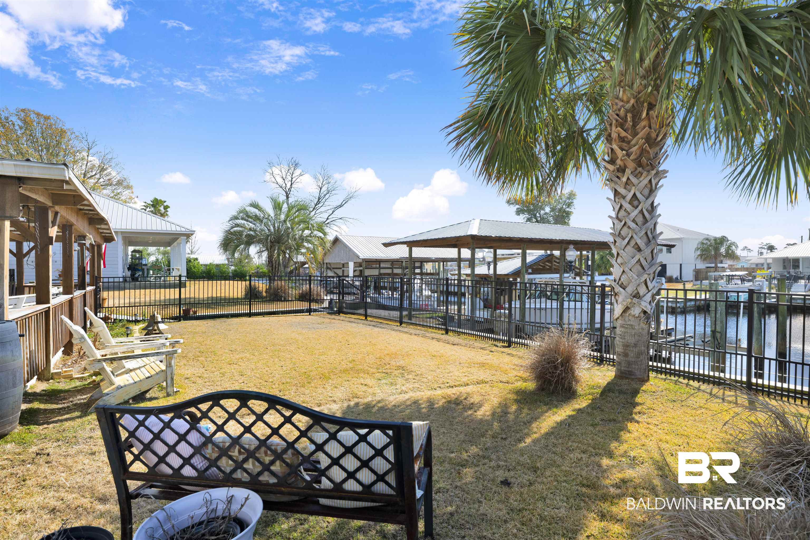 26222 Marina Road Orange Beach, AL 36561 - Photo 10 of 38 Dock with a water view and a patio area