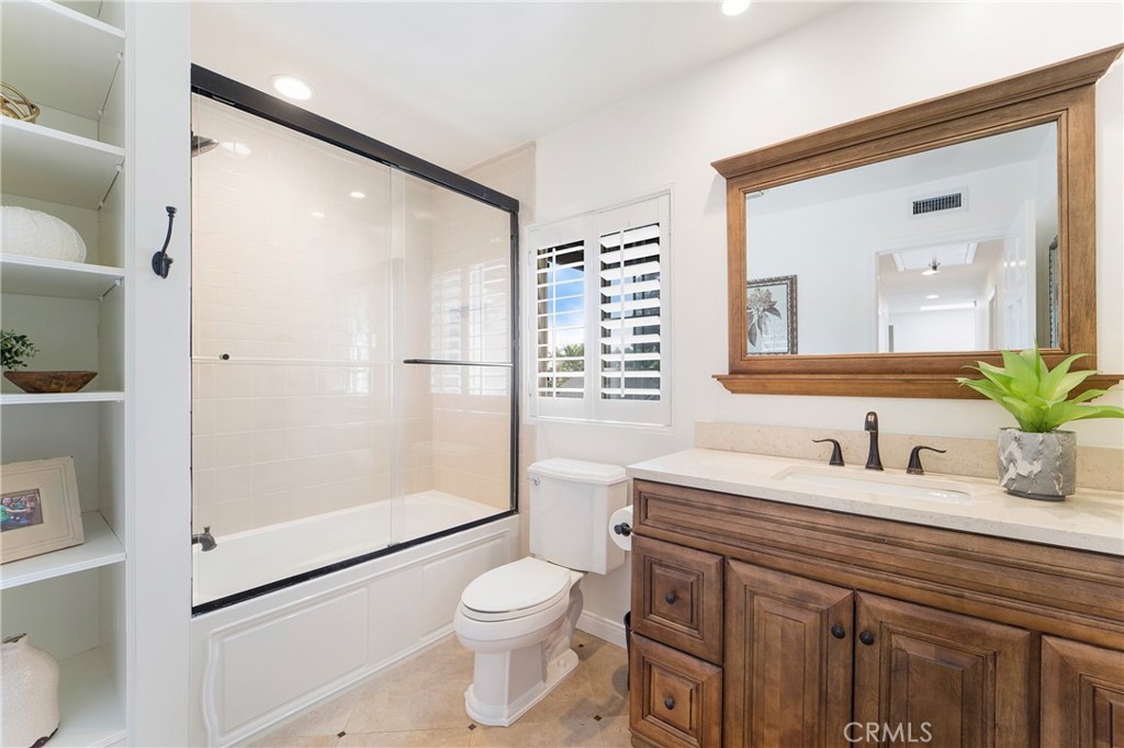 1867 Samar Drive Costa Mesa, CA 92626 - Photo 34 of 38 a bathroom with a sink a toilet and shower