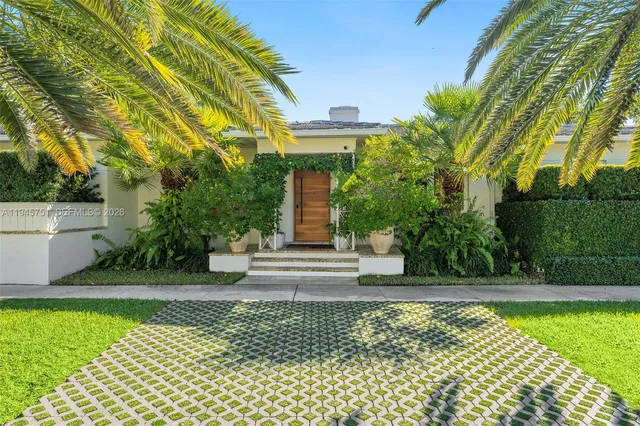 a view of a house with a garden