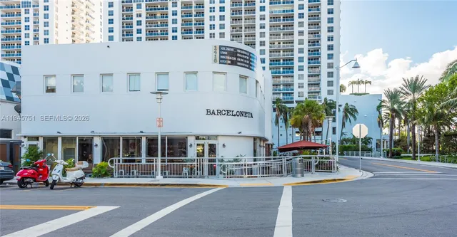 a view of a building with a street