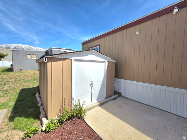 597 North State Street, Unit 67 Orem, UT 84057 - Photo 7 of 23 View of shed with a mountain view