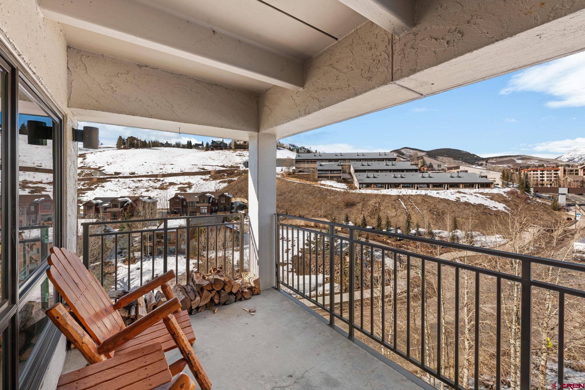 11 Snowmass Road, Unit 638 Crested Butte, CO 81225 - Photo 29 of 41 a view of a balcony with an ocean view