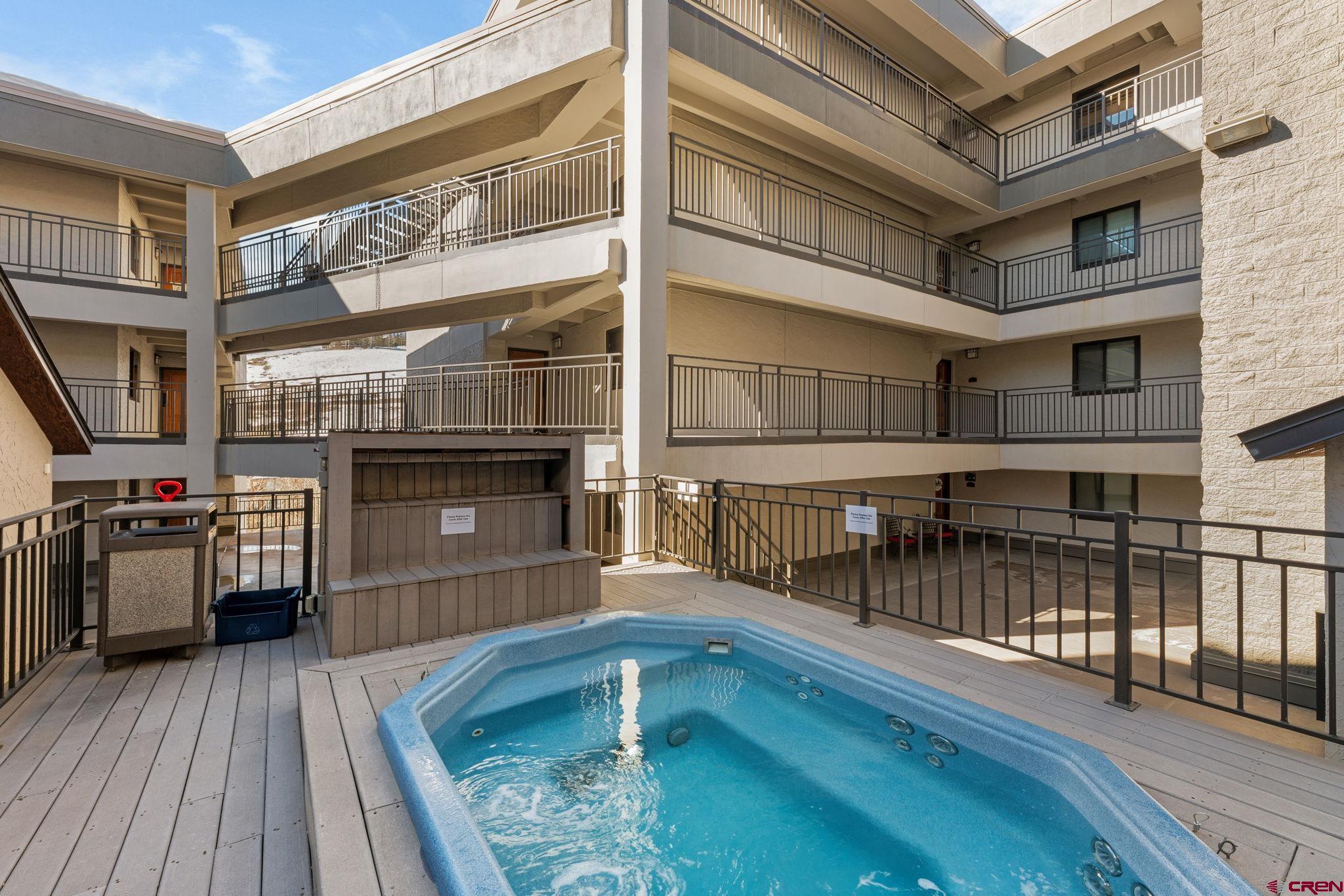 11 Snowmass Road, Unit 638 Crested Butte, CO 81225 - Photo 35 of 41 a view of a swimming pool with seating space