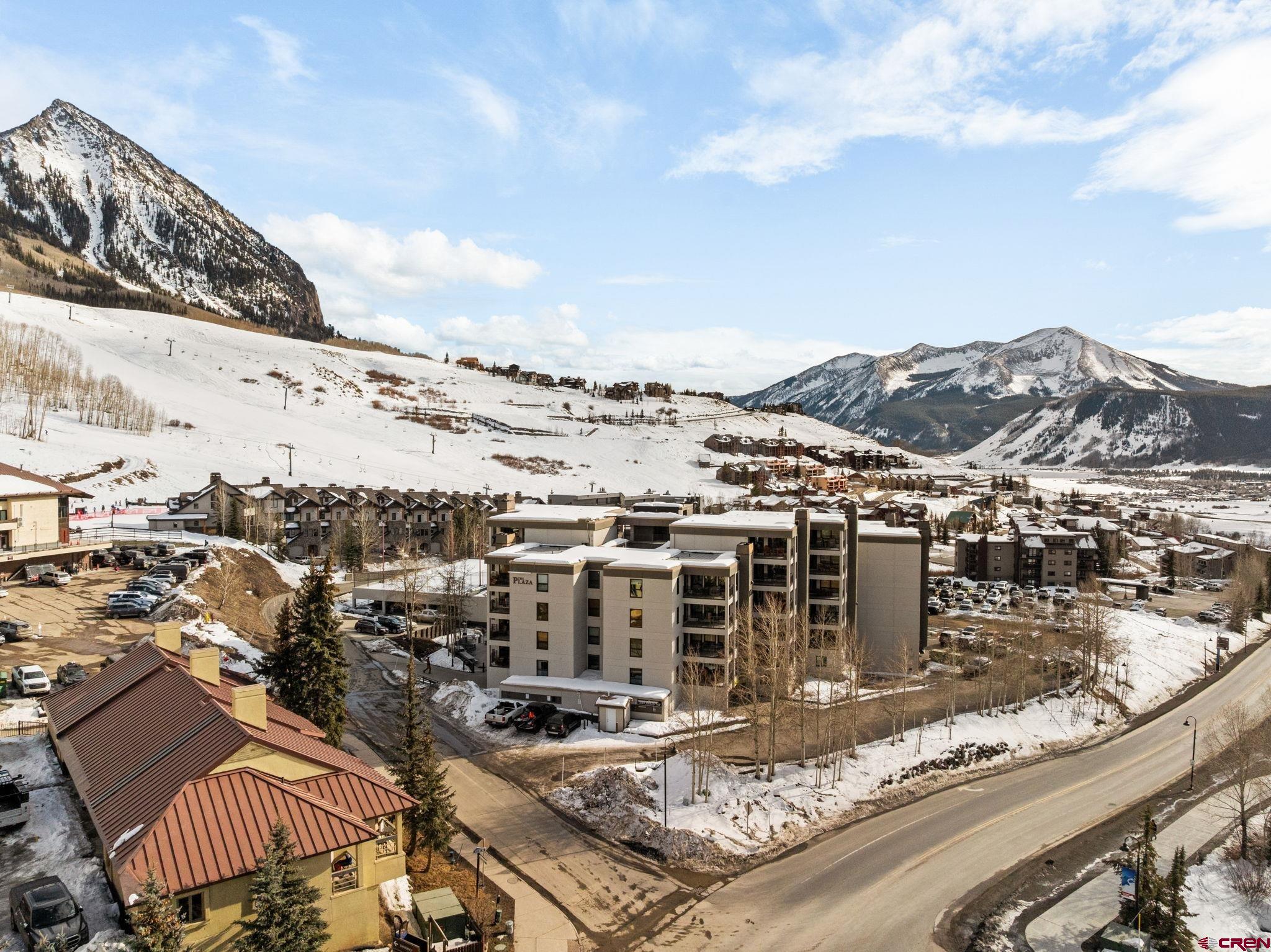 11 Snowmass Road, Unit 638 Crested Butte, CO 81225 - Photo 41 of 41 a view of a terrace with a lake